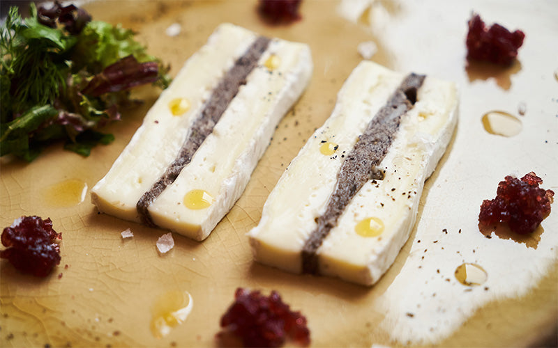 Brie Cheese with truffle and jelly Barberry Dish